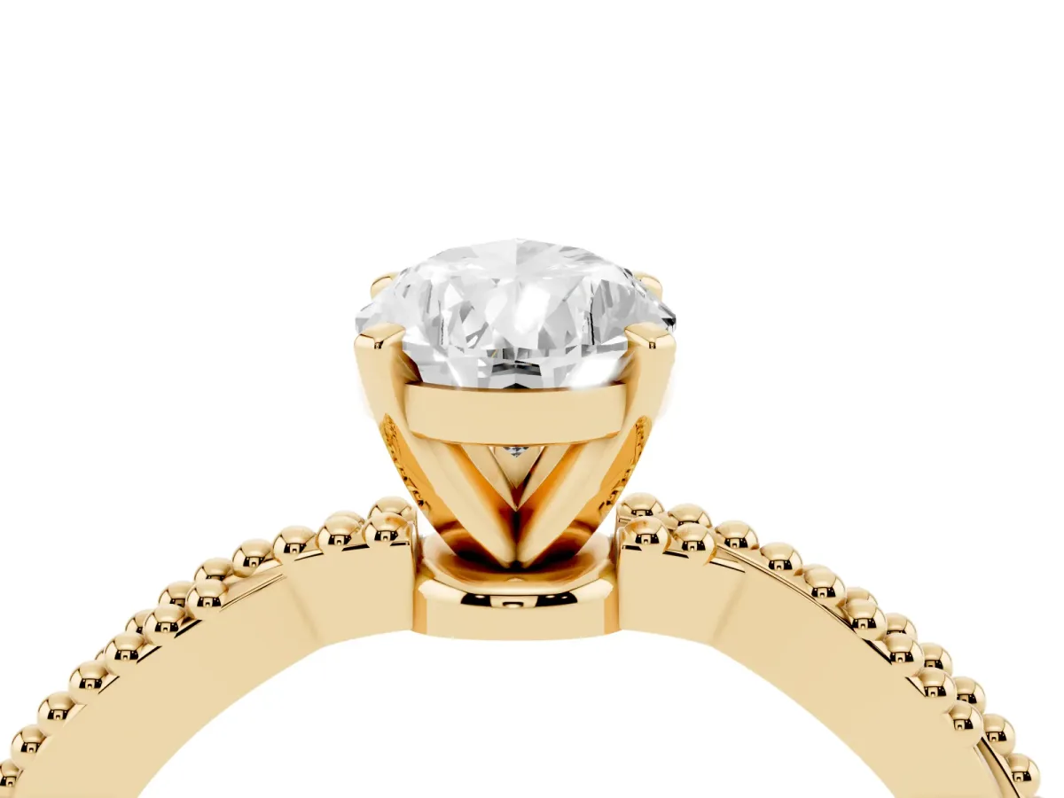 Pear Cut Solitaire Twisted Band with Bead Prong Setting Yellow gold