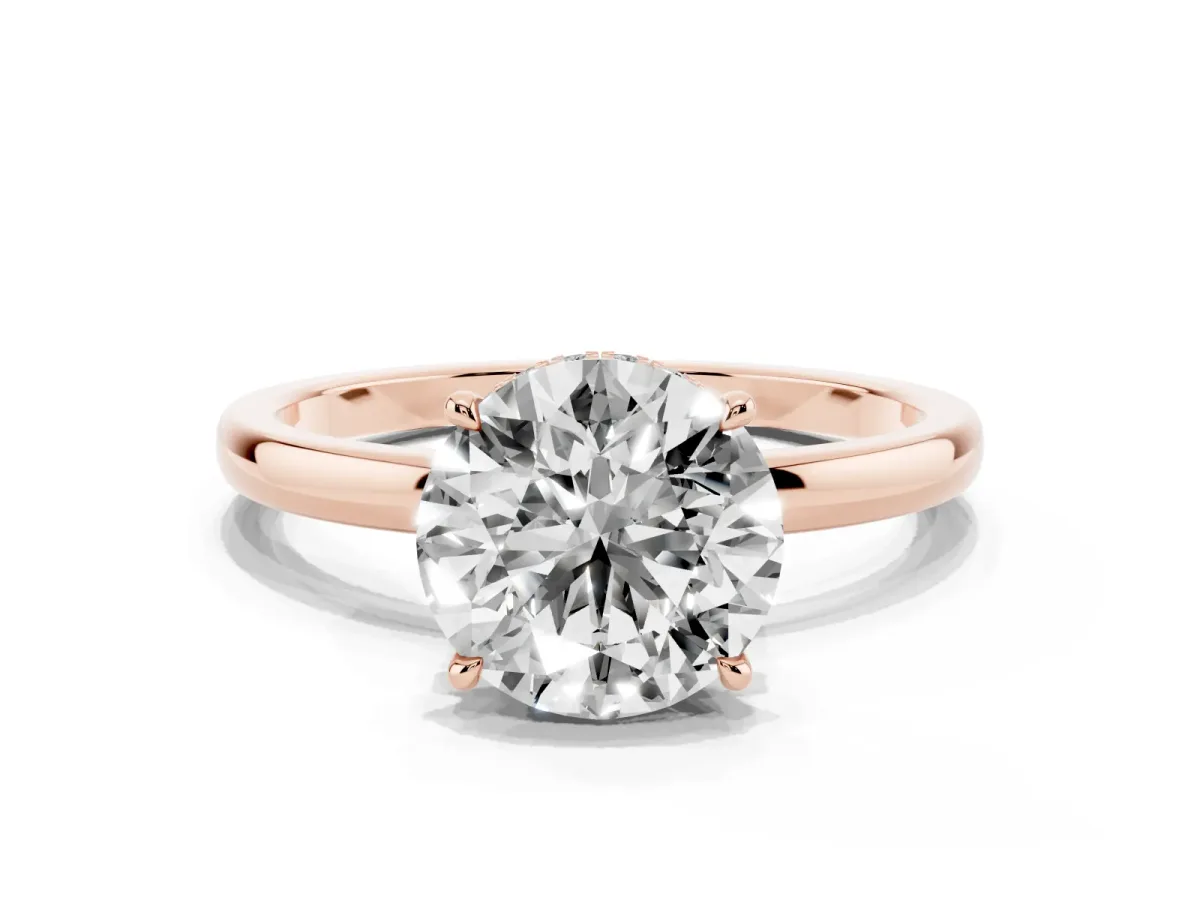Round Cut Solitaire Engagement Ring with Cathedral Band and Four-Prong Setting Rose gold