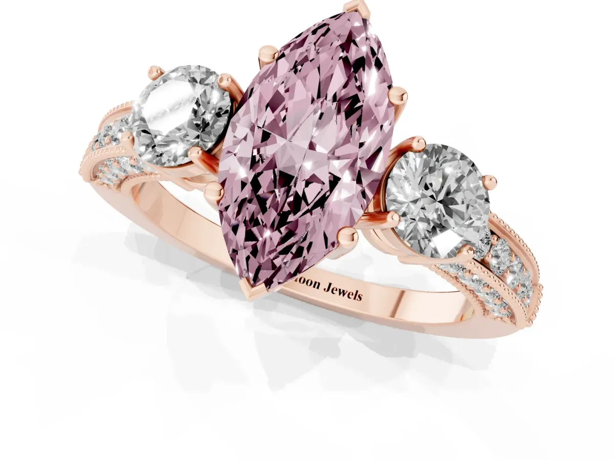 Fancy Pink Marquise Cut Three-Stone Diamond Ring with Pavé Band and Four-Prong Setting Rose gold