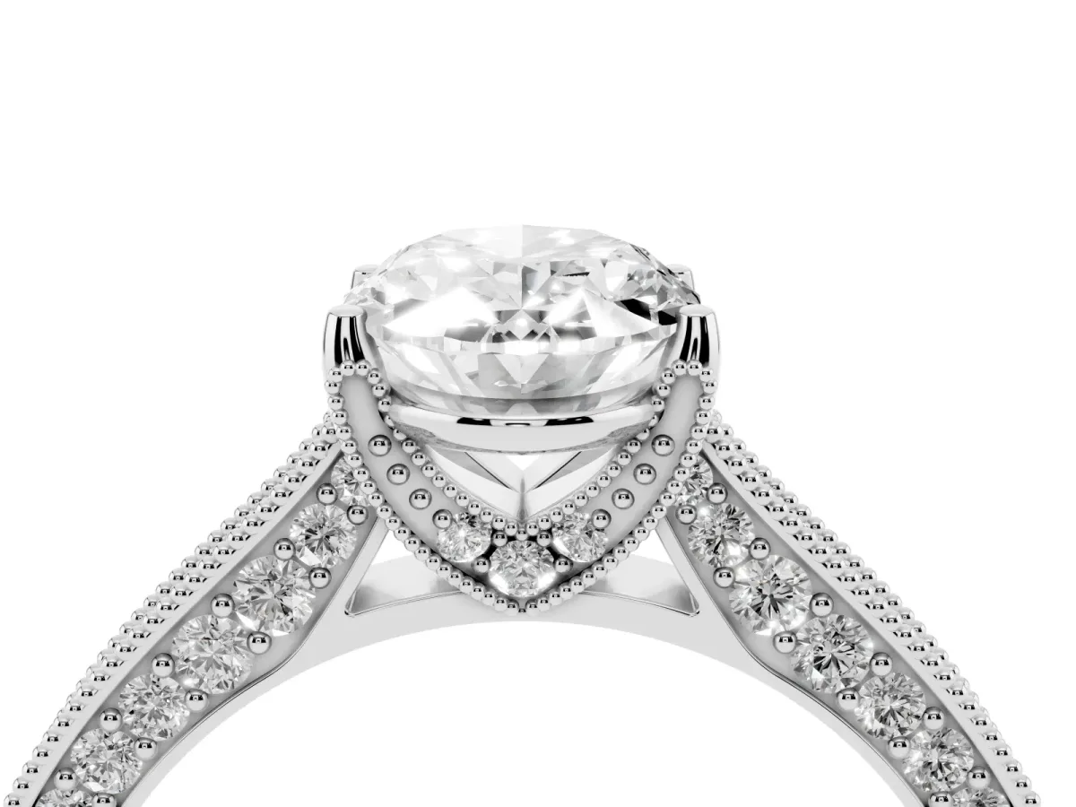Oval Cut Cut Diamond Solitaire Ring with Milgrain Pave Band and Four Prong Setting Platinum