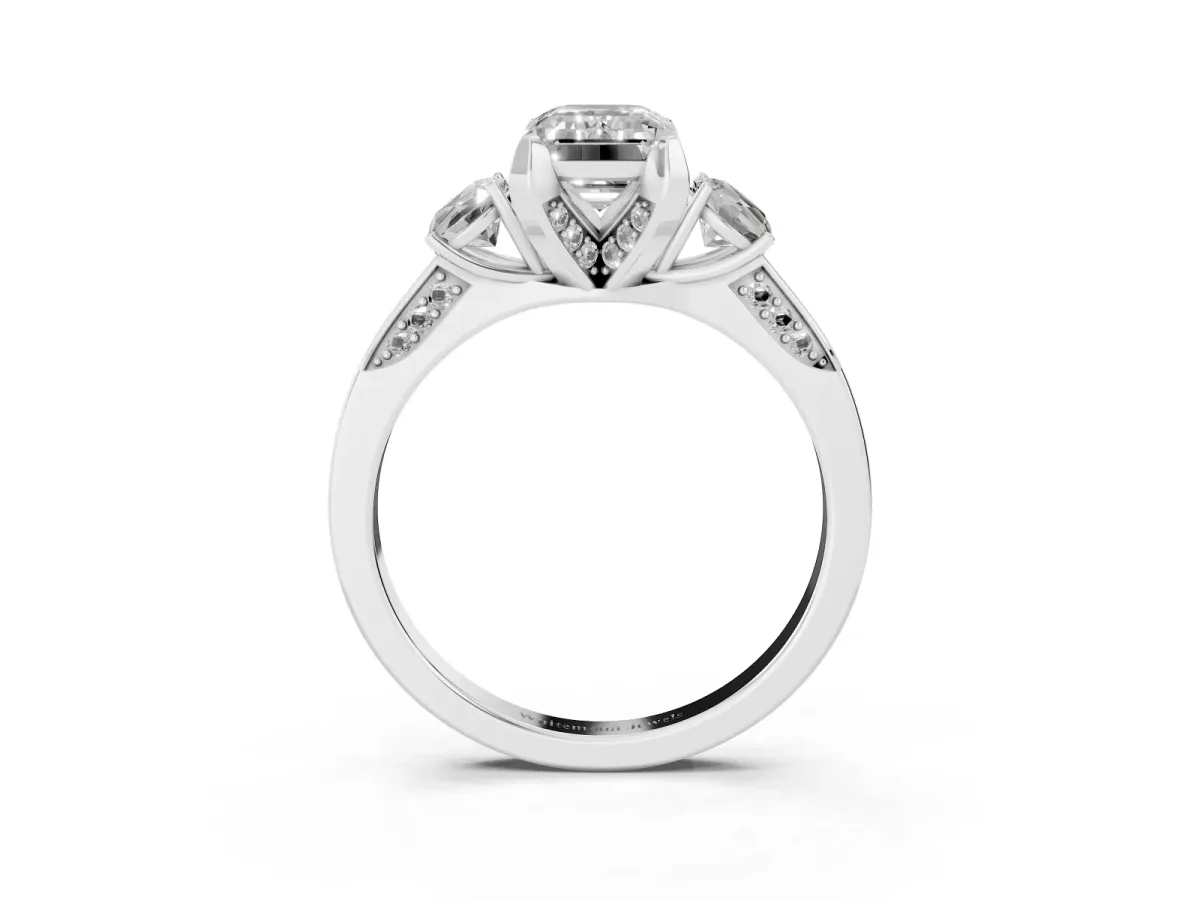 Emerald Cut Brilliant Three-Stone Diamond Ring with Pavé Band and Four-Prong Setting White gold