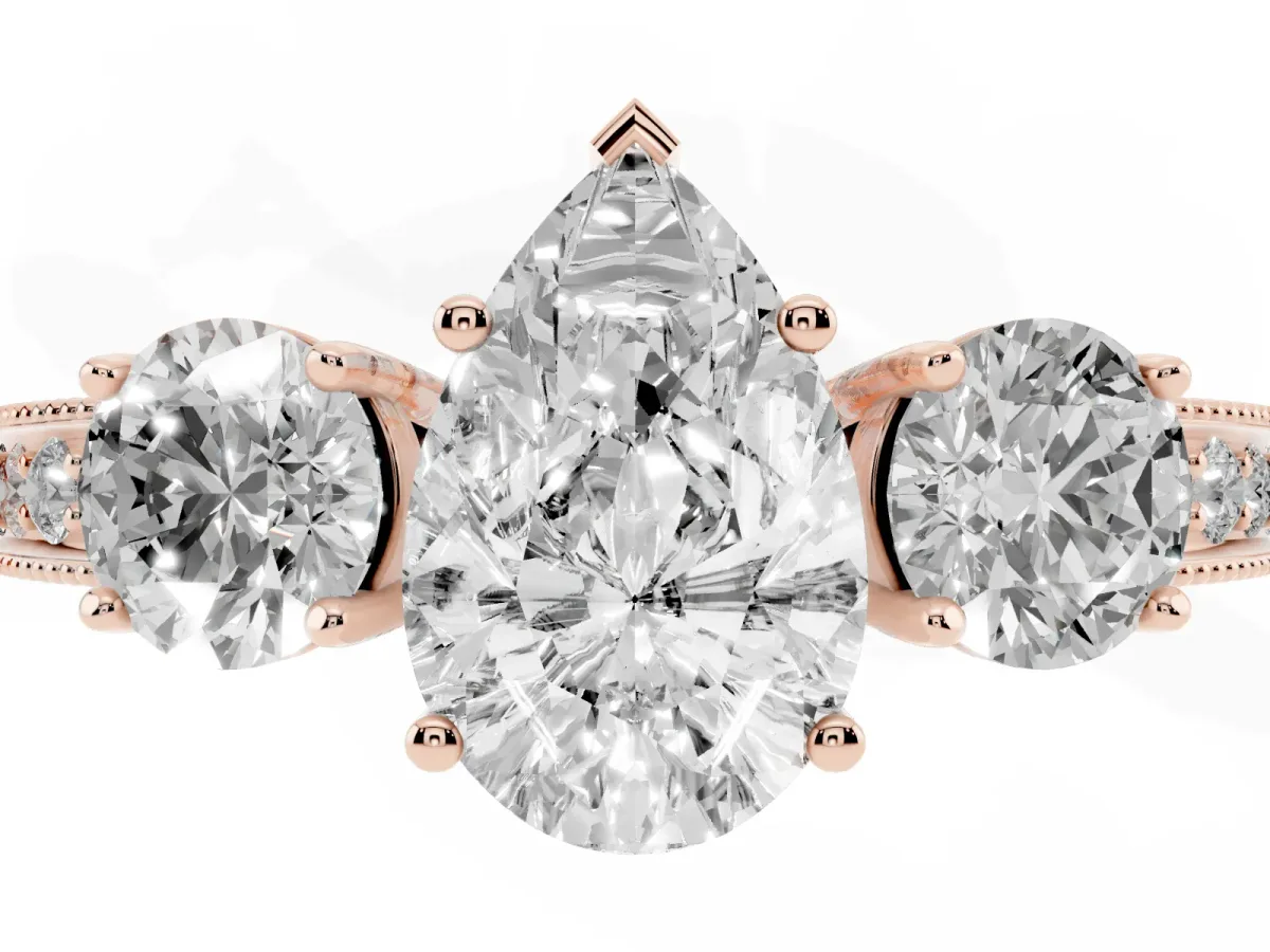 Pear Cut Three-Stone Diamond Ring with Pavé Band and Four-Prong Setting Rose gold