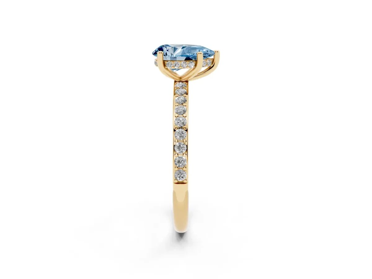 Fancy Blue Pear Cut Cut Diamond Pavé Band Ring with Four-Prong Setting Yellow gold
