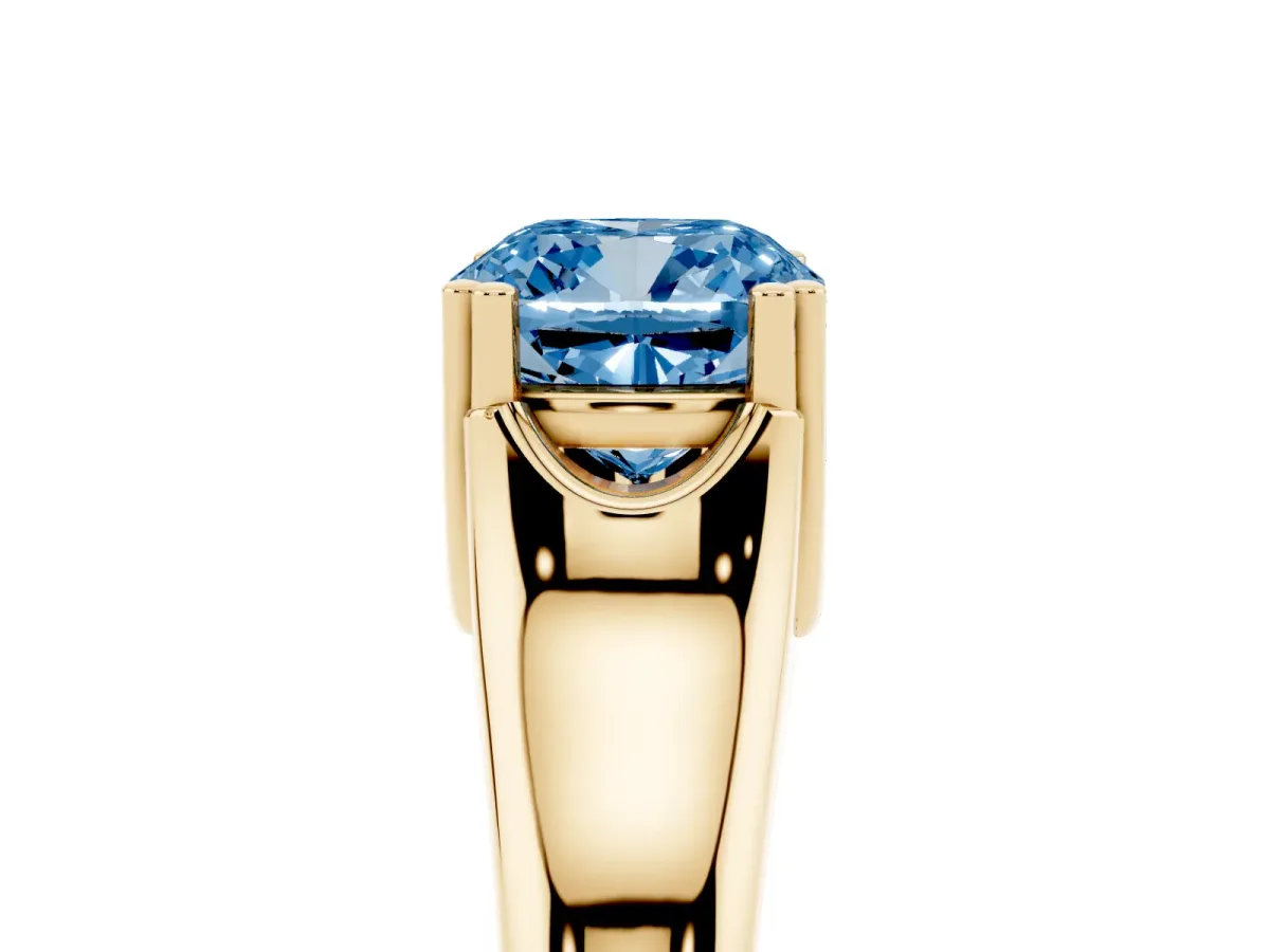 Fancy Blue Cushion Cut Diamond Solitaire Ring with Wide Band and Prong Setting Yellow gold