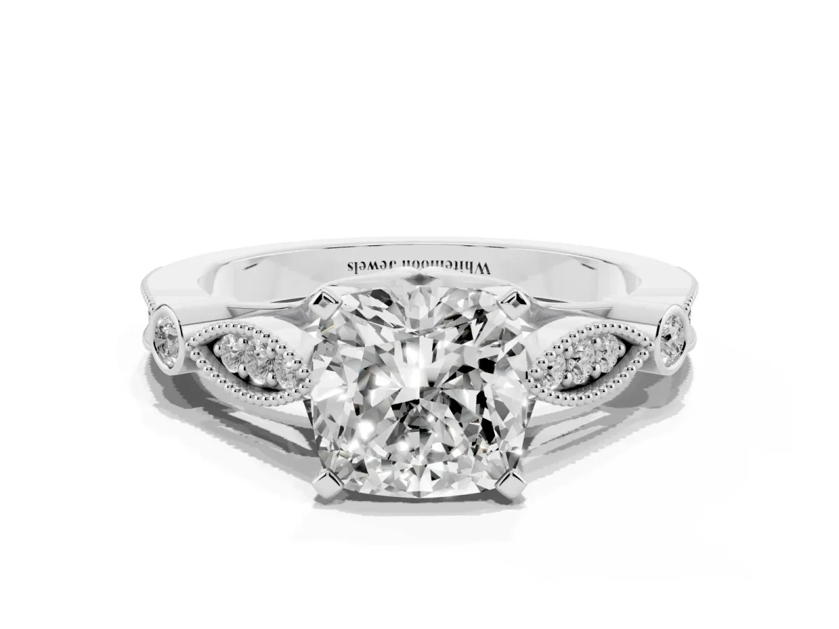 Cushion Cut Cut Diamond with Milgrain Marquise and Bezel Accents on a Solitaire Band with Prong Setting Platinum
