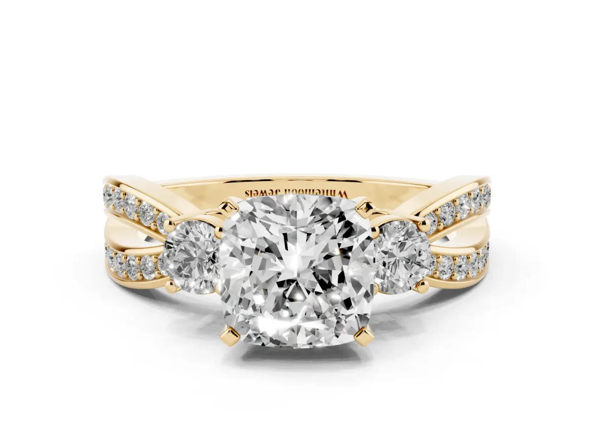 Three-Stone Cushion Cut Cut Diamond Twist Band with Prong Setting Yellow gold
