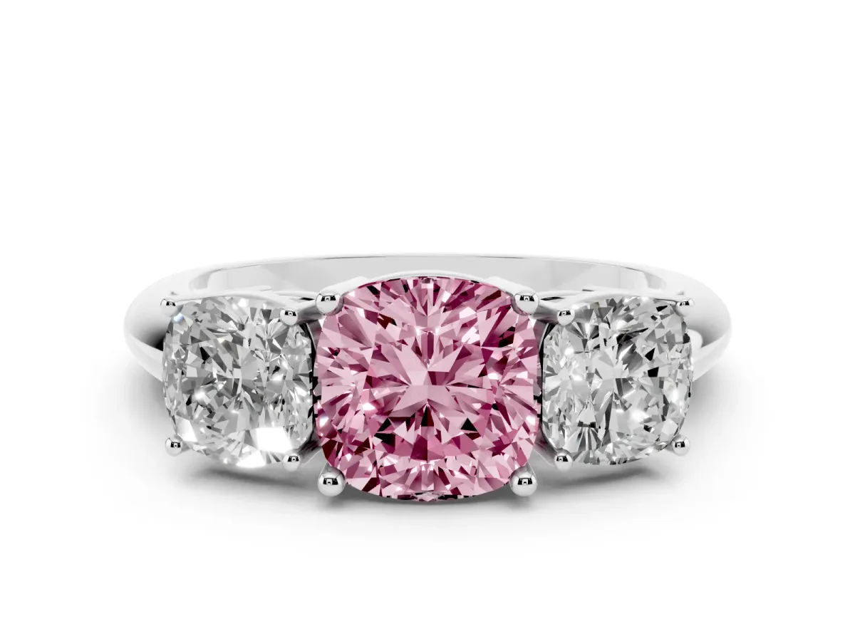 Fancy Pink Three-Stone Cushion Cut Cut Diamond Engagement Ring with Prong Setting on a White Gold Band Platinum