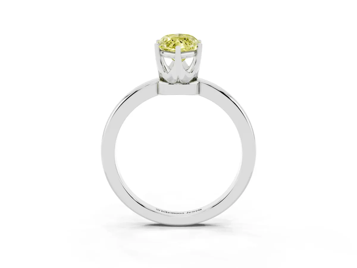Fancy Yellow Marquise Cut Solitaire Diamond Ring with Six-Prong Setting on a Classic Band Silver