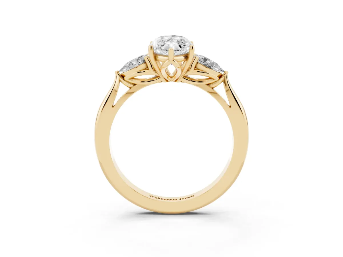 Three-Stone Marquise Cut Brilliant Diamond Solitaire Ring with Tapered Band and Four-Prong Setting Yellow gold