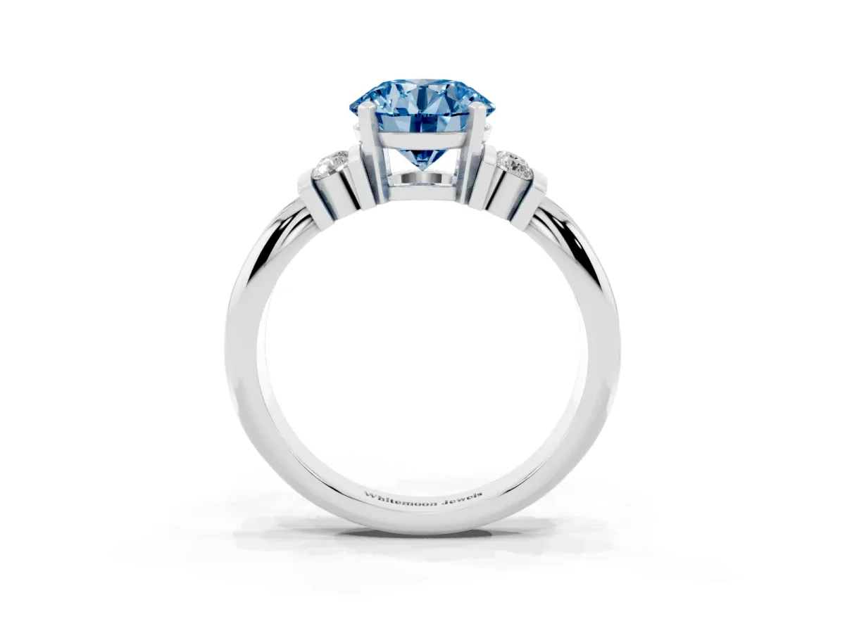 Fancy Blue Round Cut Cut Three-Stone Channel Set Ring with Bar Prongs Silver