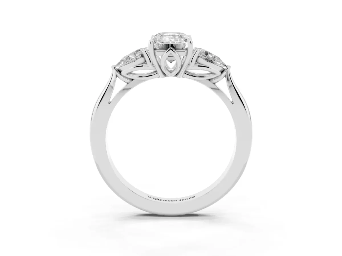 Three-Stone Emerald Cut Brilliant Diamond Solitaire Ring with Tapered Band and Four-Prong Setting Platinum