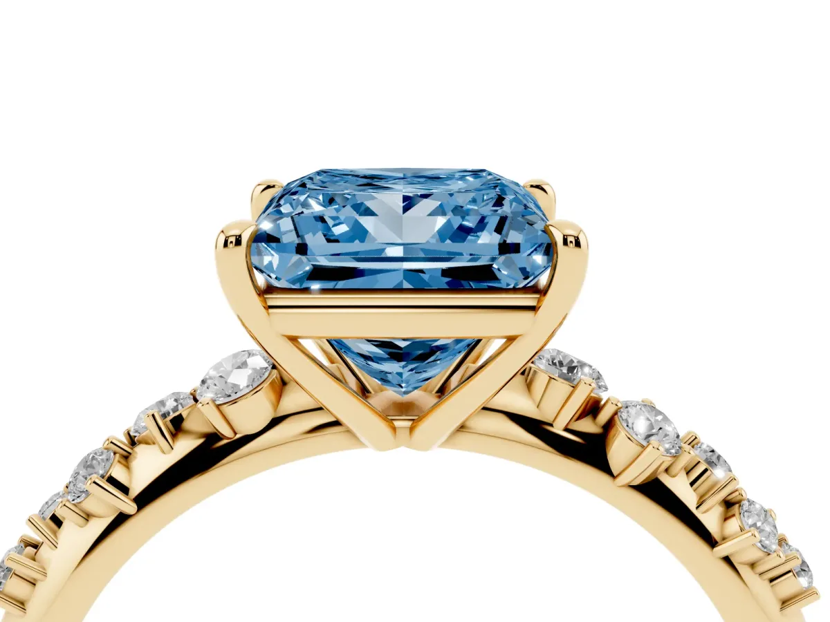 Fancy Blue Princess Cut Diamond Cluster Side Stone Solitaire Ring with Prong Setting Yellow gold