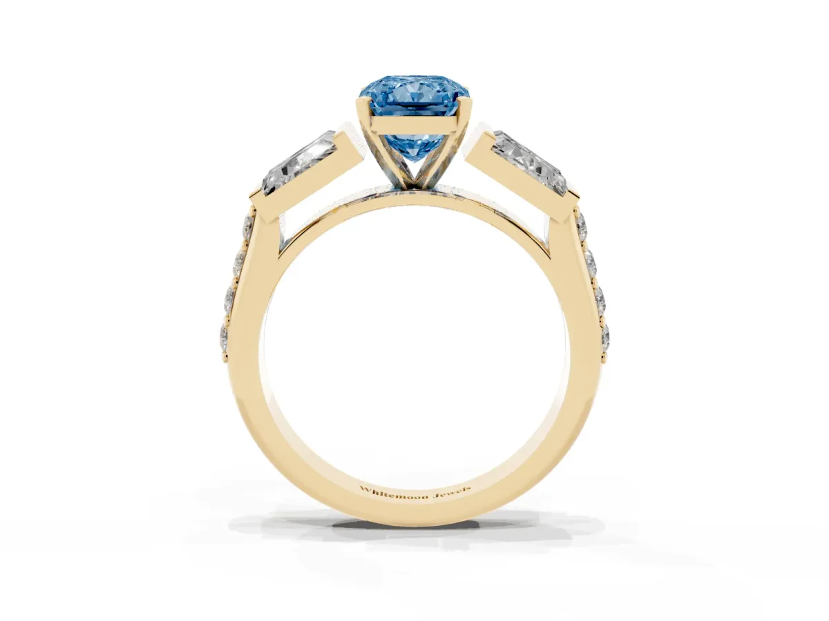 Fancy Blue Radiant Cut Diamond Engagement Ring with Baguette Side Stones and Channel Set Band Yellow gold