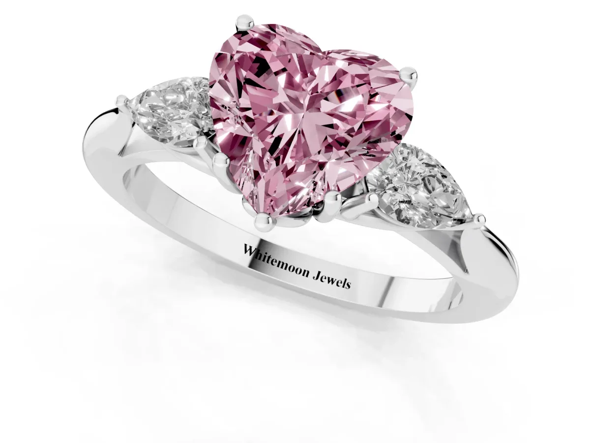 Fancy Pink Three-Stone Heart Cut Diamond Ring with Pear Side Stones in Four-Prong Setting Silver