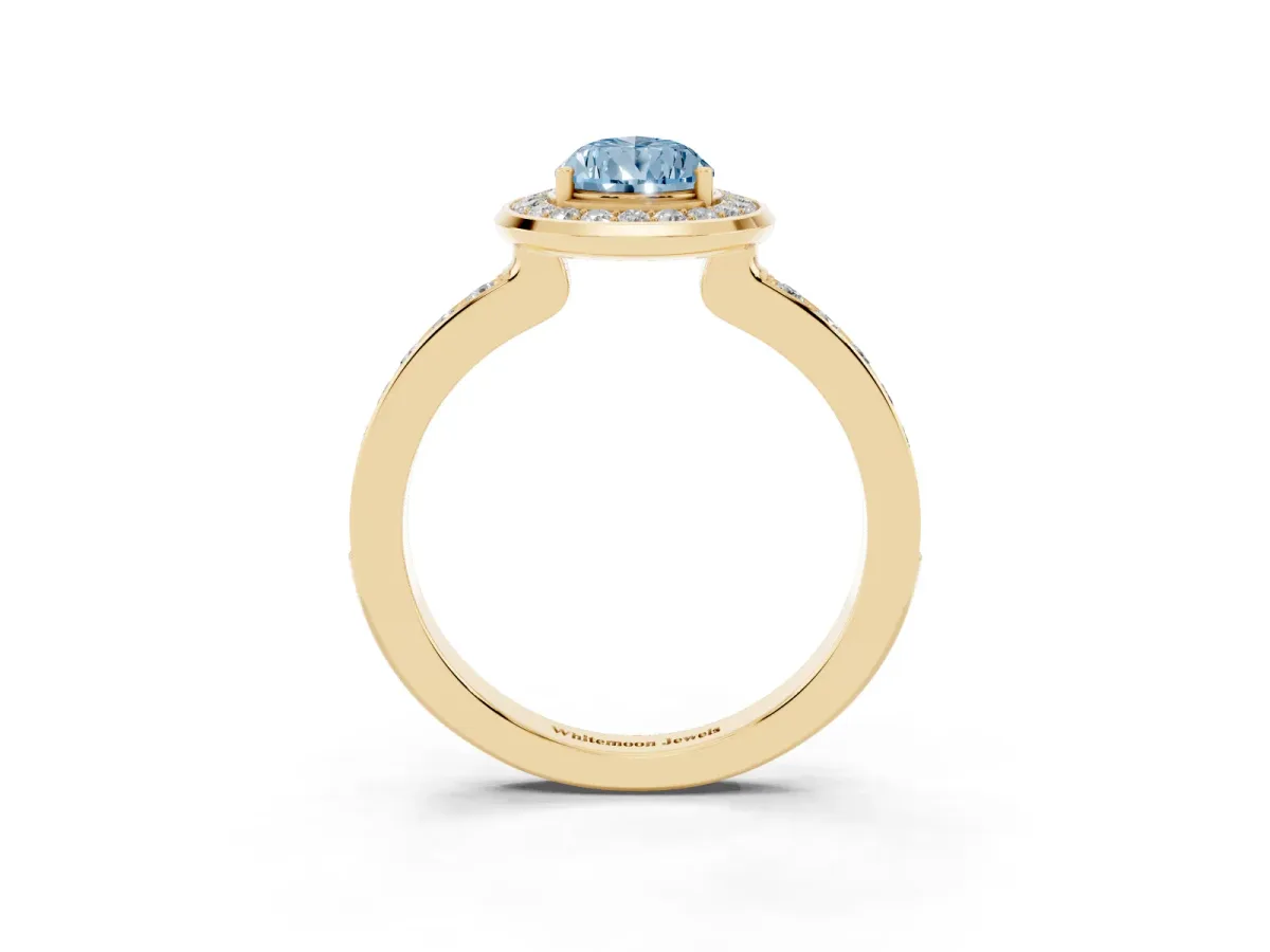 Fancy Blue Pear Cut Diamond Halo Ring with Bezel Frame and Pavé Band Yellow gold