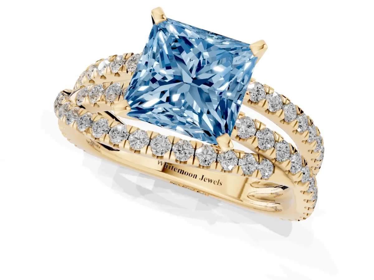 Fancy Blue Princess Cut Solitaire Twist Band with Pavé Setting and Four-Prong Setting Yellow gold