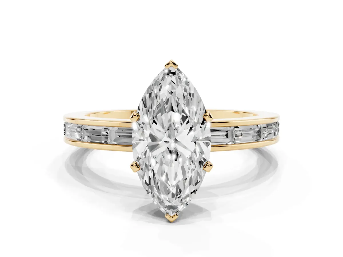 Marquise Cut Solitaire Diamond Ring with Channel-Set Baguette Band and Four-Prong Setting Yellow gold