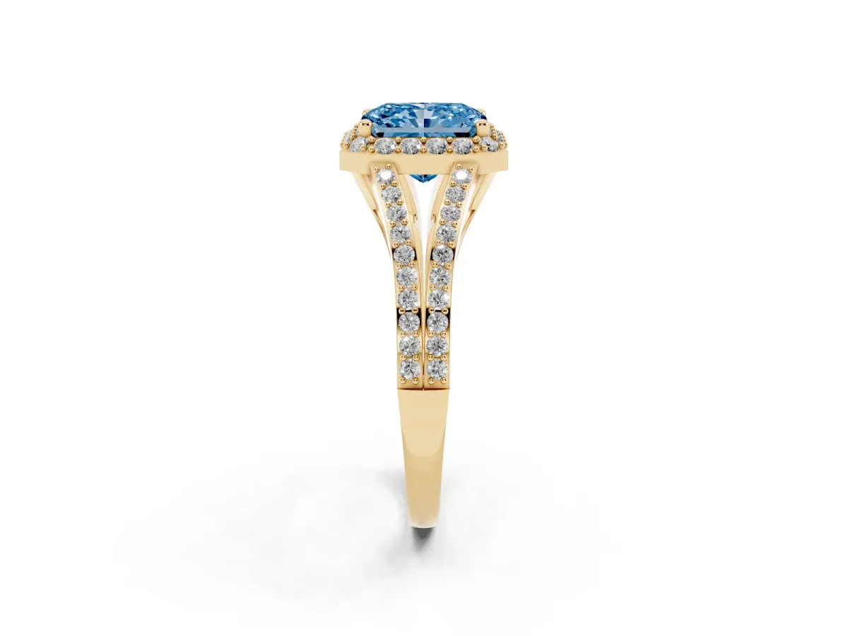 Fancy Blue Radiant Cut Halo Split Shank Pave Diamond Ring with Four-Prong Setting Yellow gold
