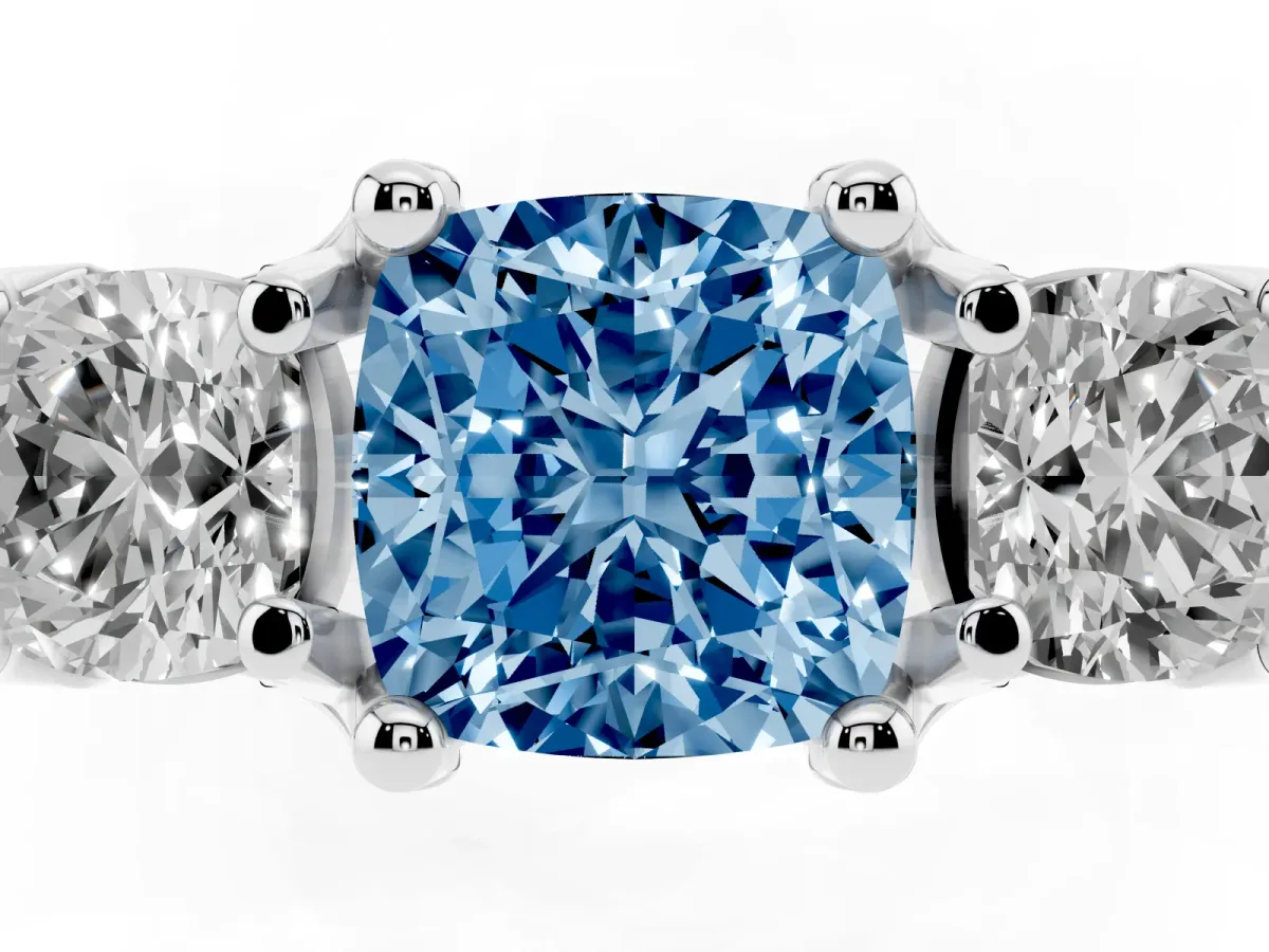 Fancy Blue Cushion Cut Diamond Three-Stone Ring with Channel Set Band and Four-Prong Setting Silver
