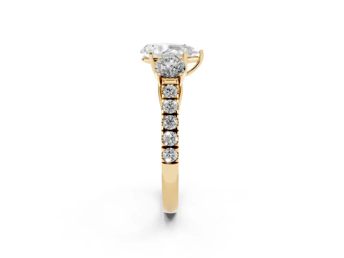 Pear Cut Cut Diamond Three-Stone Ring with Round Side Stones and Pavé Band Yellow gold