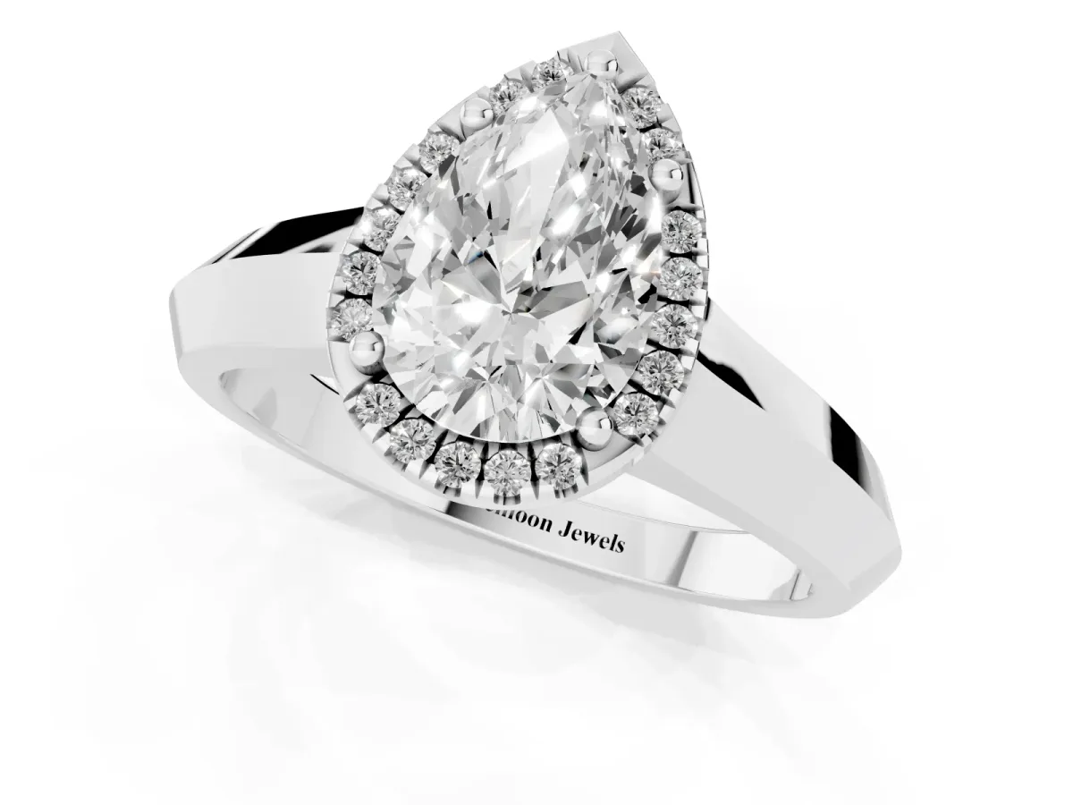 Pear Cut Halo Diamond Ring with Cathedral Band and Four-Prong Setting Silver