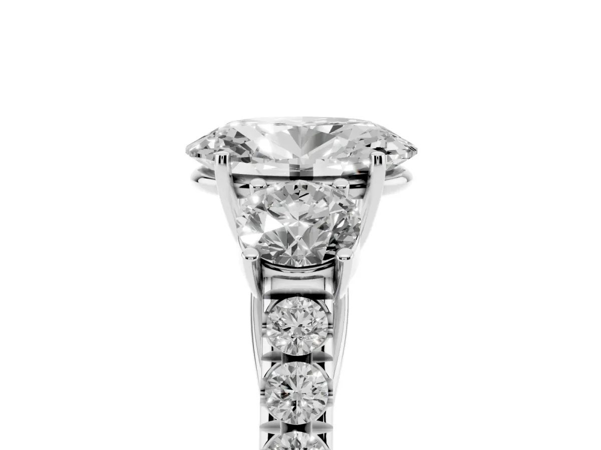 Oval Cut Cut Diamond Three-Stone Ring with Round Side Stones and Pavé Band Silver