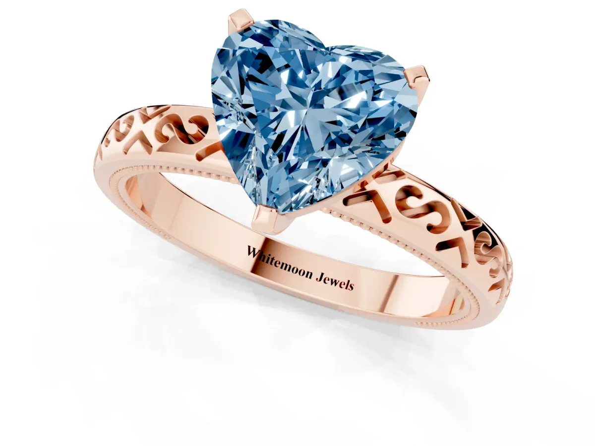 Fancy Blue Heart Cut Solitaire Engagement Ring with Scrollwork Band and Four-Prong Setting Rose gold