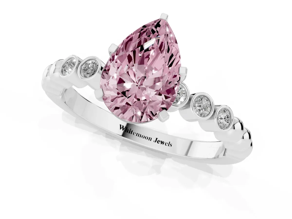 Fancy Pink Pear Cut Solitaire Bezel Accent Diamond Engagement Ring with Beaded Band and Four-Prong Setting Silver