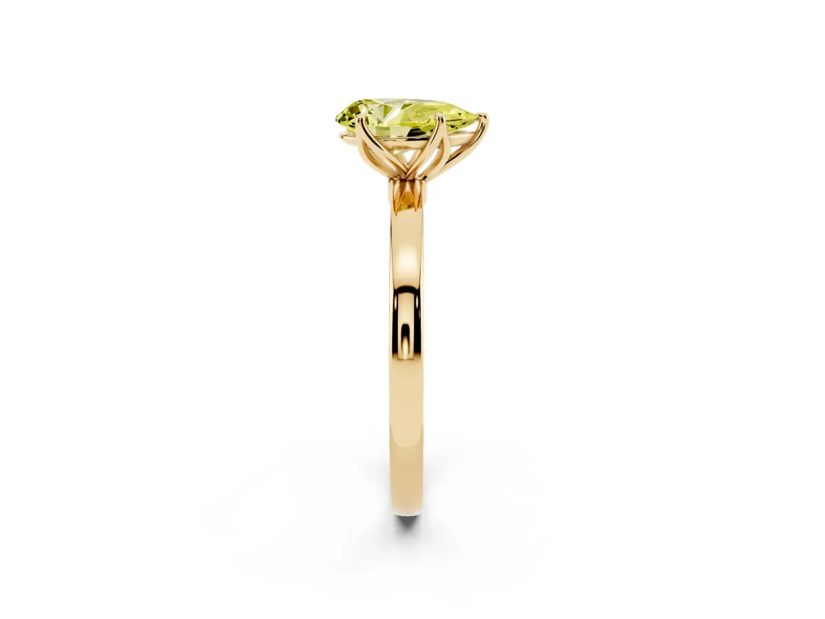 Fancy Yellow Pear Cut Diamond Solitaire Ring with Thin Band and Prong Setting Yellow gold