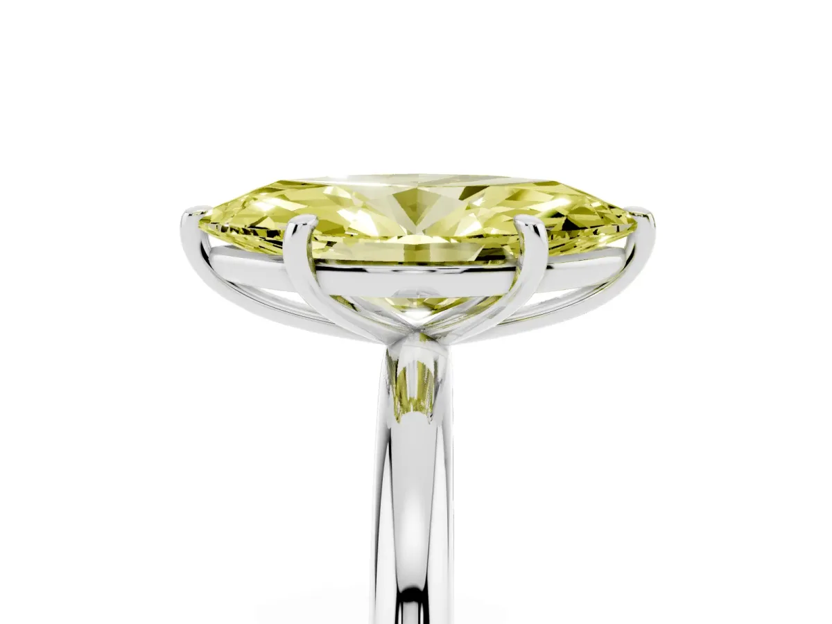 Fancy Yellow Oval Cut Solitaire Diamond Ring with Four-Prong Setting on a Plain Band Platinum