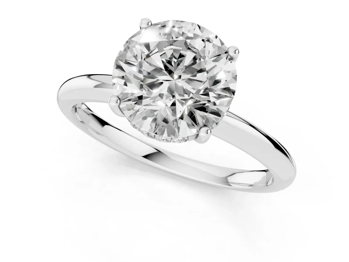 Round Cut Cut Solitaire Engagement Ring with Four-Prong Setting and Classic Band White gold