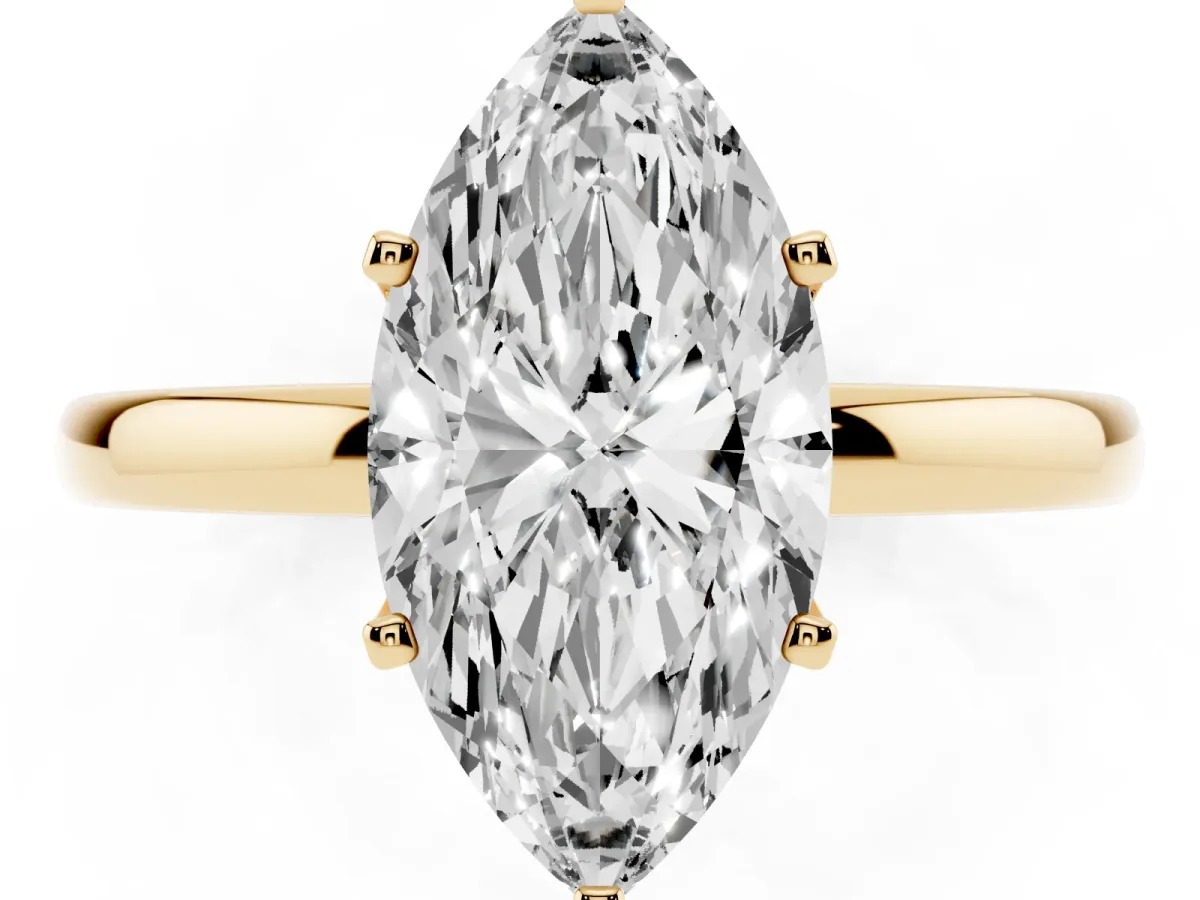 Marquise Cut Solitaire Diamond Ring with Six-Prong Setting on a Classic Band Yellow gold