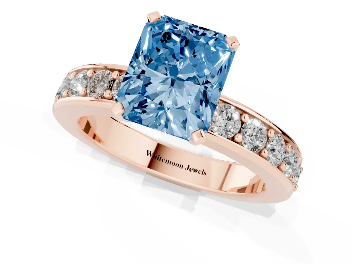 Fancy Blue Radiant Cut Diamond Engagement Ring with Channel Set Round Band and Prong Setting Rose gold