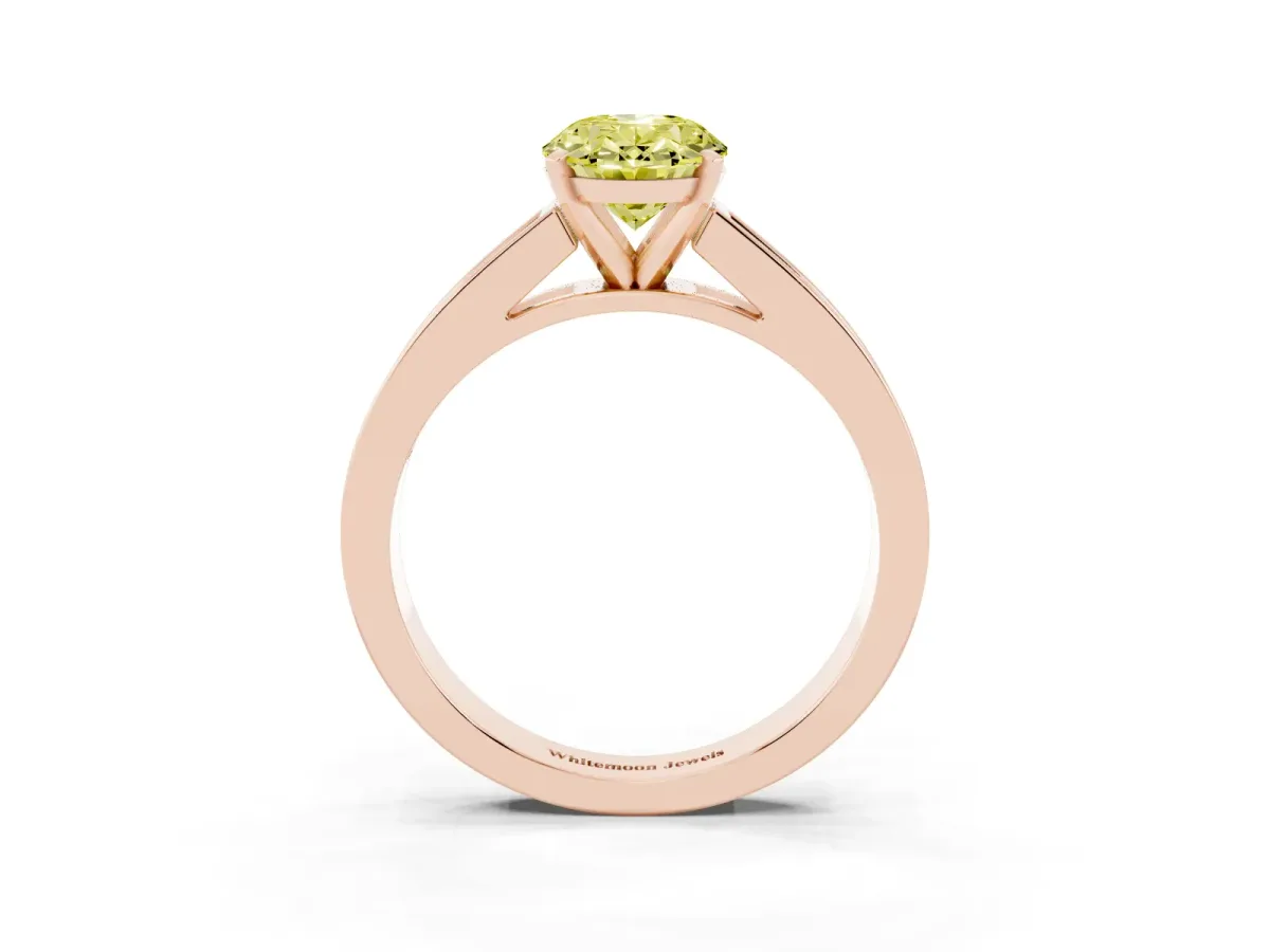 Fancy Yellow Oval Cut Solitaire Diamond Ring with Channel-Set Band and Four-Prong Setting Rose gold