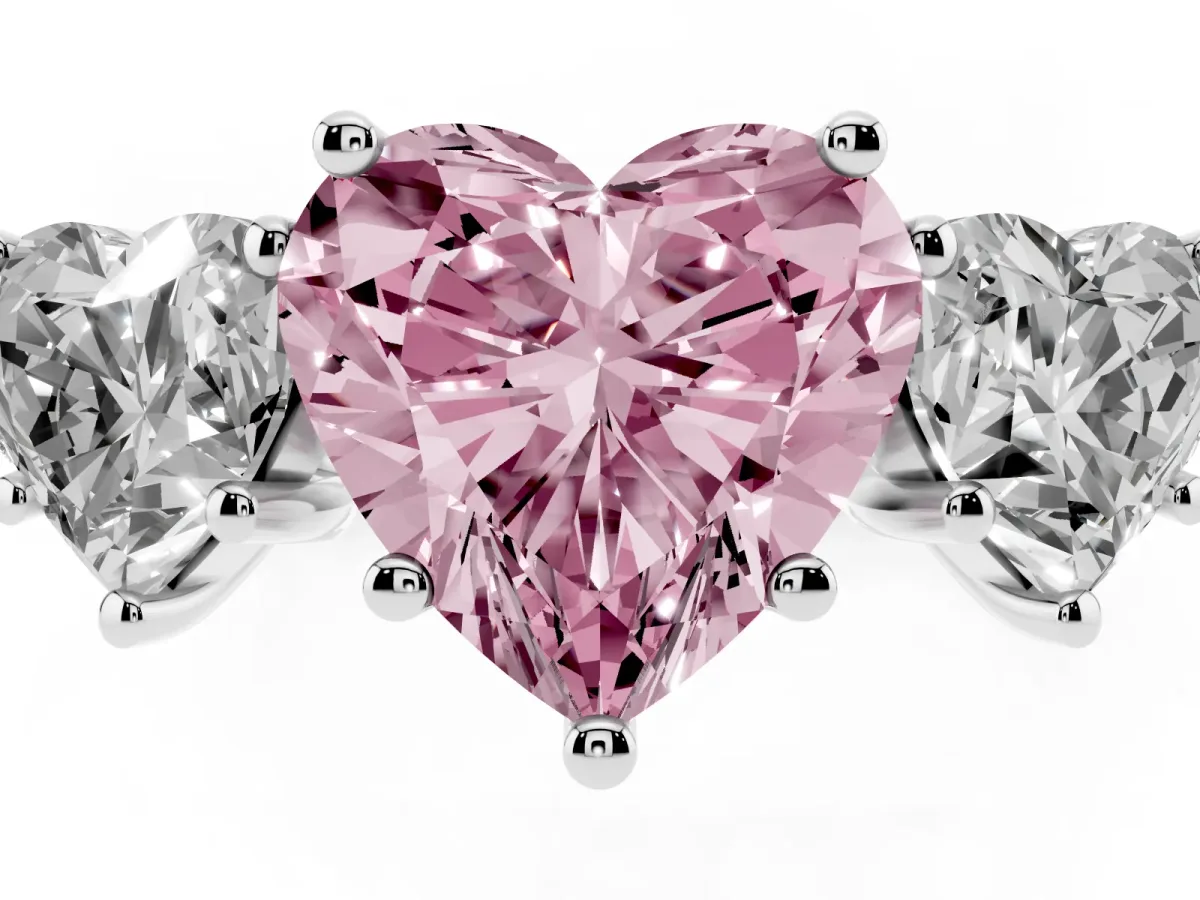 Fancy Pink Three-Stone Heart Cut Diamond Ring with Round Pavé Band and Prong Setting Silver
