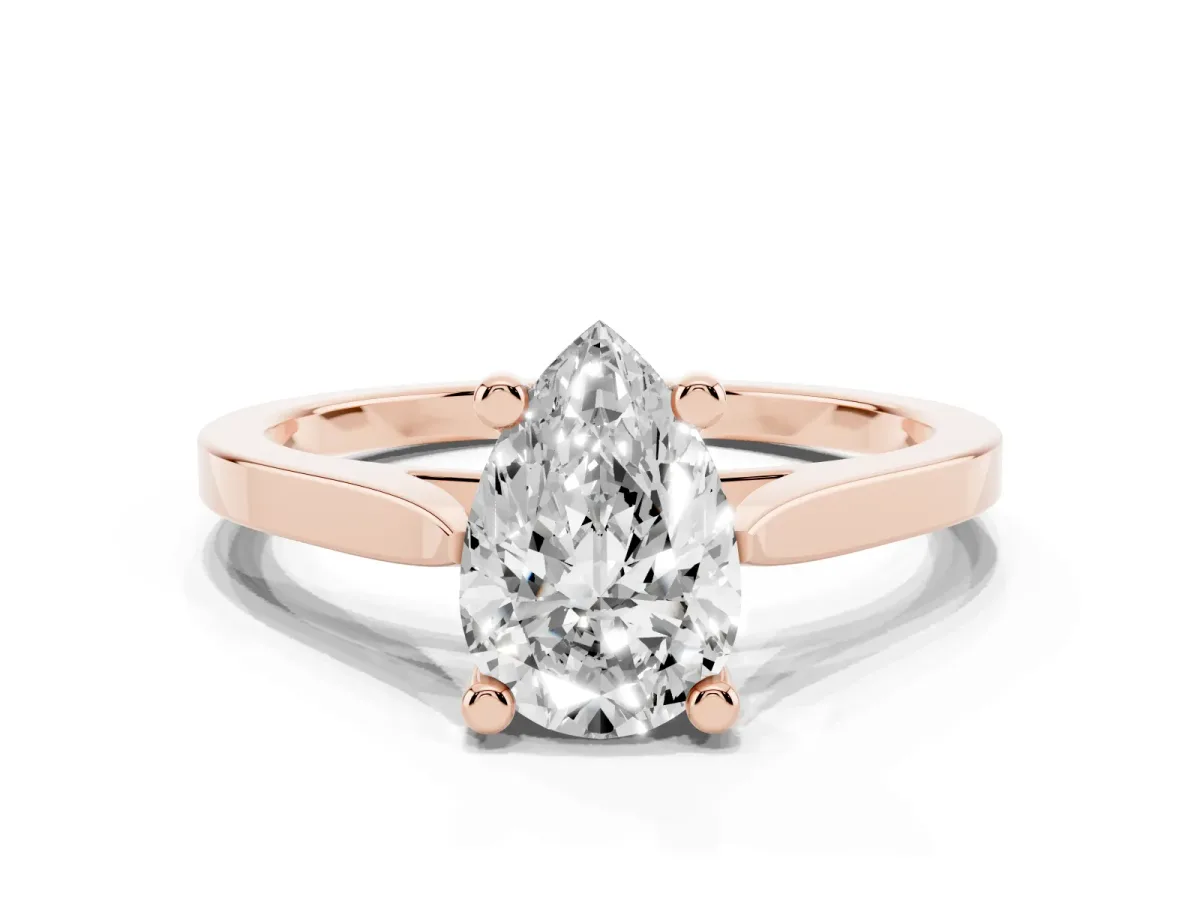 Pear Cut Solitaire Diamond Ring with Four-Prong Setting and Tapered Band Rose gold