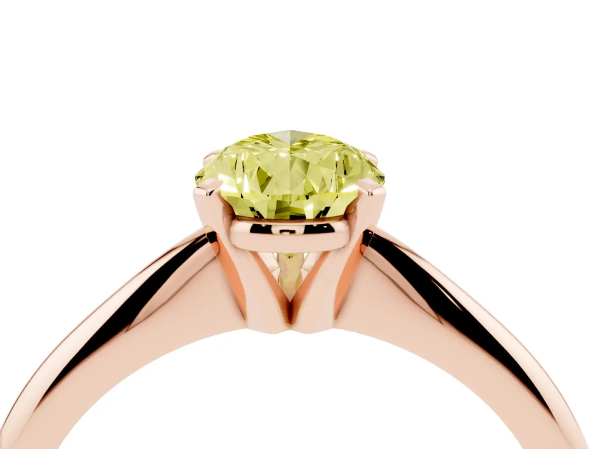 Fancy Yellow Pear Cut Cut Solitaire Ring with Four-Prong Setting on a Classic Band Rose gold