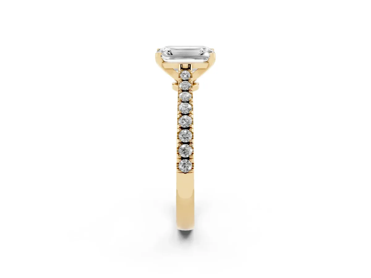 Emerald Cut Cut Solitaire Diamond Engagement Ring with Pave Band and Four-Prong Setting Yellow gold