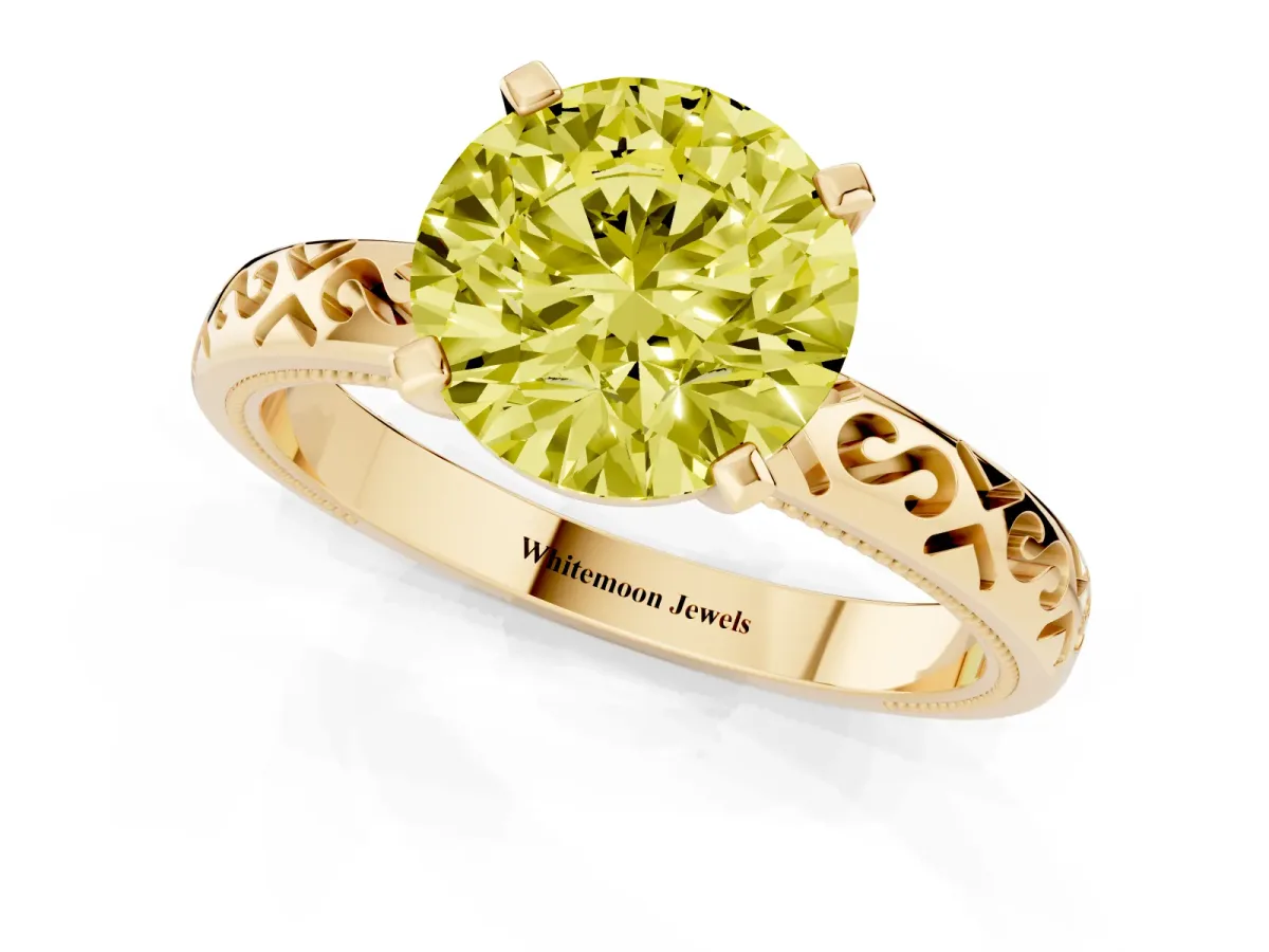 Fancy Yellow Round Cut Solitaire Engagement Ring with Scrollwork Band and Four-Prong Setting Yellow gold