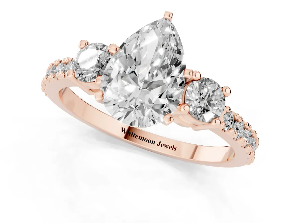Pear Cut Three-Stone Diamond Pavé Band with Prong Setting Rose gold