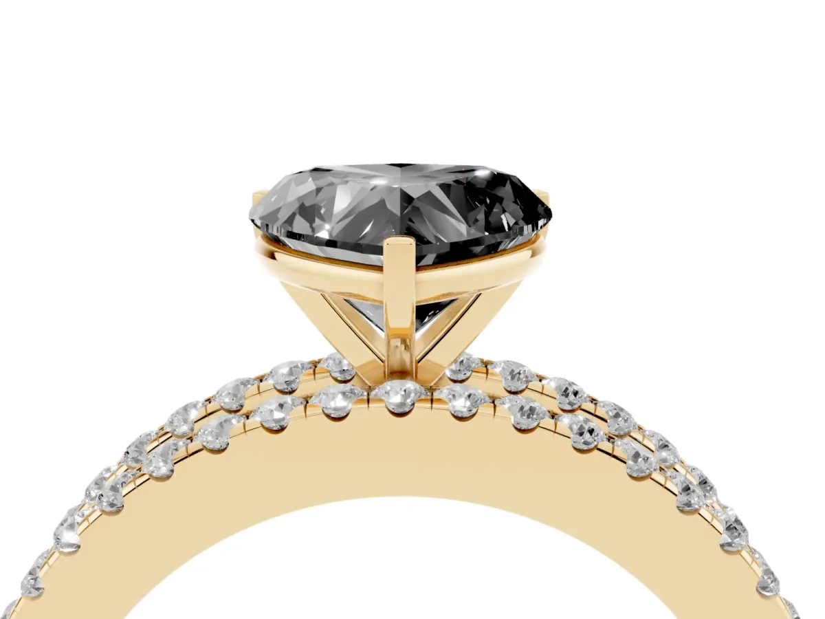Fancy Black Heart Cut Diamond Solitaire Ring with Pavé and Channel Set Band Yellow gold