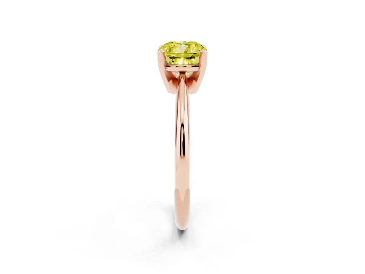 Fancy Yellow Cushion Cut Cut Solitaire Ring with Four-Prong Setting on a Classic Band Rose gold