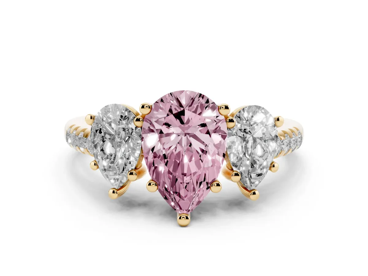Fancy Pink Three-Stone Pear Cut Diamond Ring with Round Pavé Band and Prong Setting Yellow gold