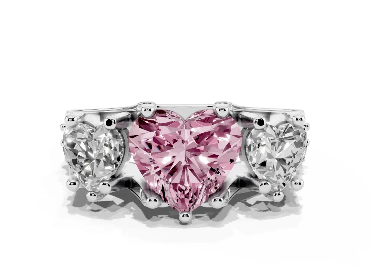 Fancy Pink Heart Cut Diamond Three-Stone Ring with Channel Set Band and Four-Prong Setting Silver