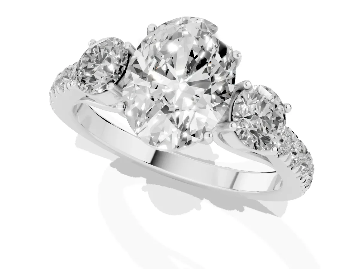 Oval Cut Cut Diamond Three-Stone Ring with Round Side Stones and Pavé Band Silver