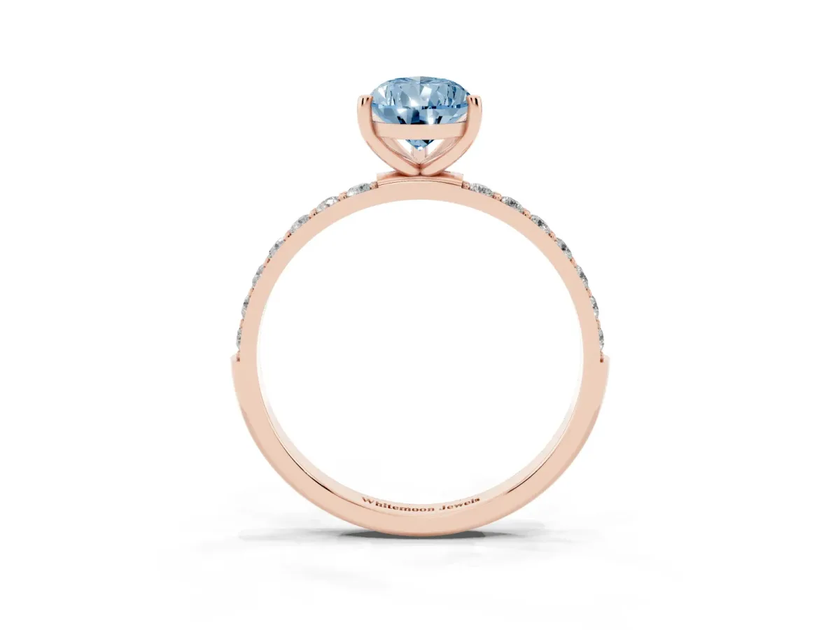 Fancy Blue Pear Cut Diamond Solitaire Ring with Round Pavé Shoulders and Prong Setting Rose gold