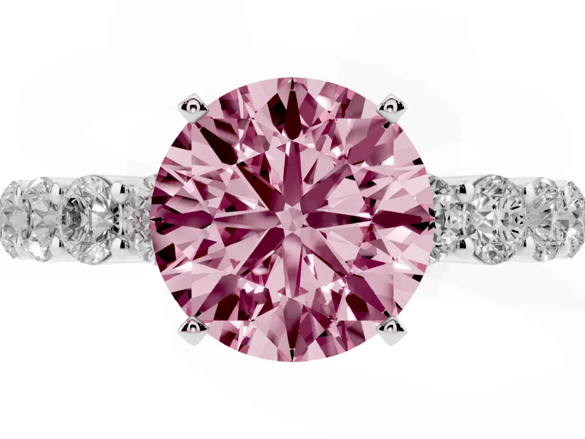 Fancy Pink Round Cut Diamond Solitaire Ring with Shared Prong Round Side Stones Platinum
