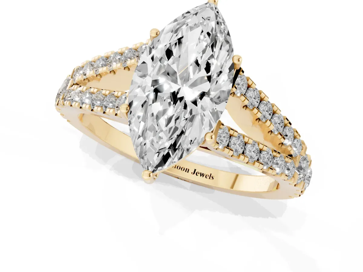 Marquise Cut Diamond Split Shank Engagement Ring with Round Pavé and Prong Setting Yellow gold