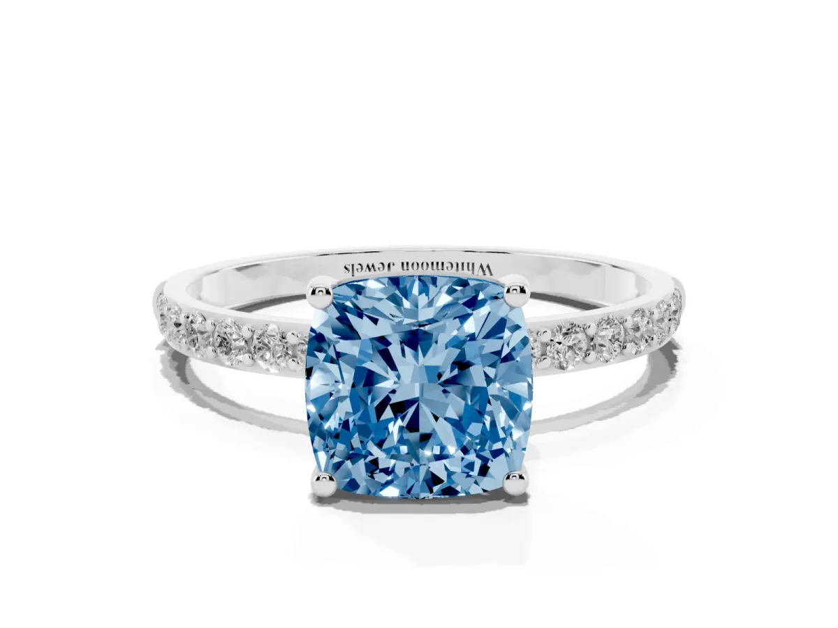 Fancy Blue Cushion Cut Diamond Solitaire Ring with Round Pavé Shoulders and Prong Setting Silver