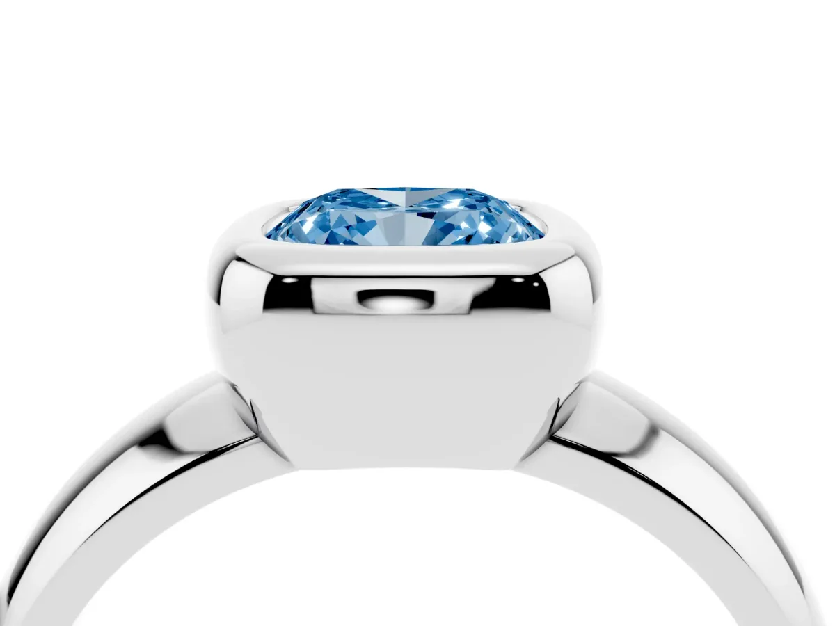 Fancy Blue Bezel Set Cushion Cut Solitaire Ring with Wide Band Silver